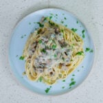 Top view of a plate of Creamy Mushroom Pasta, perfectly cooked and ready to serve.